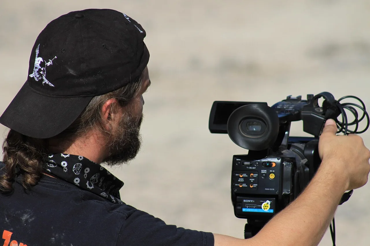 people, man, adult, film director, movie camera, brown camera, brown movie, brown film, film director, film director, film director, film director, film director